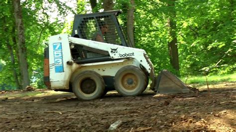 leveling land with a skid steer|leveling ground with a bobcat.